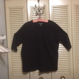 Woman within black three-quarter sleeve T-shirt